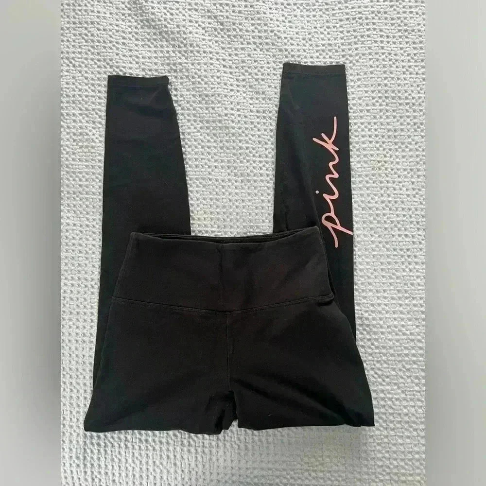 Victoria Secret High Waisted Leggings size M with pink written down right calf